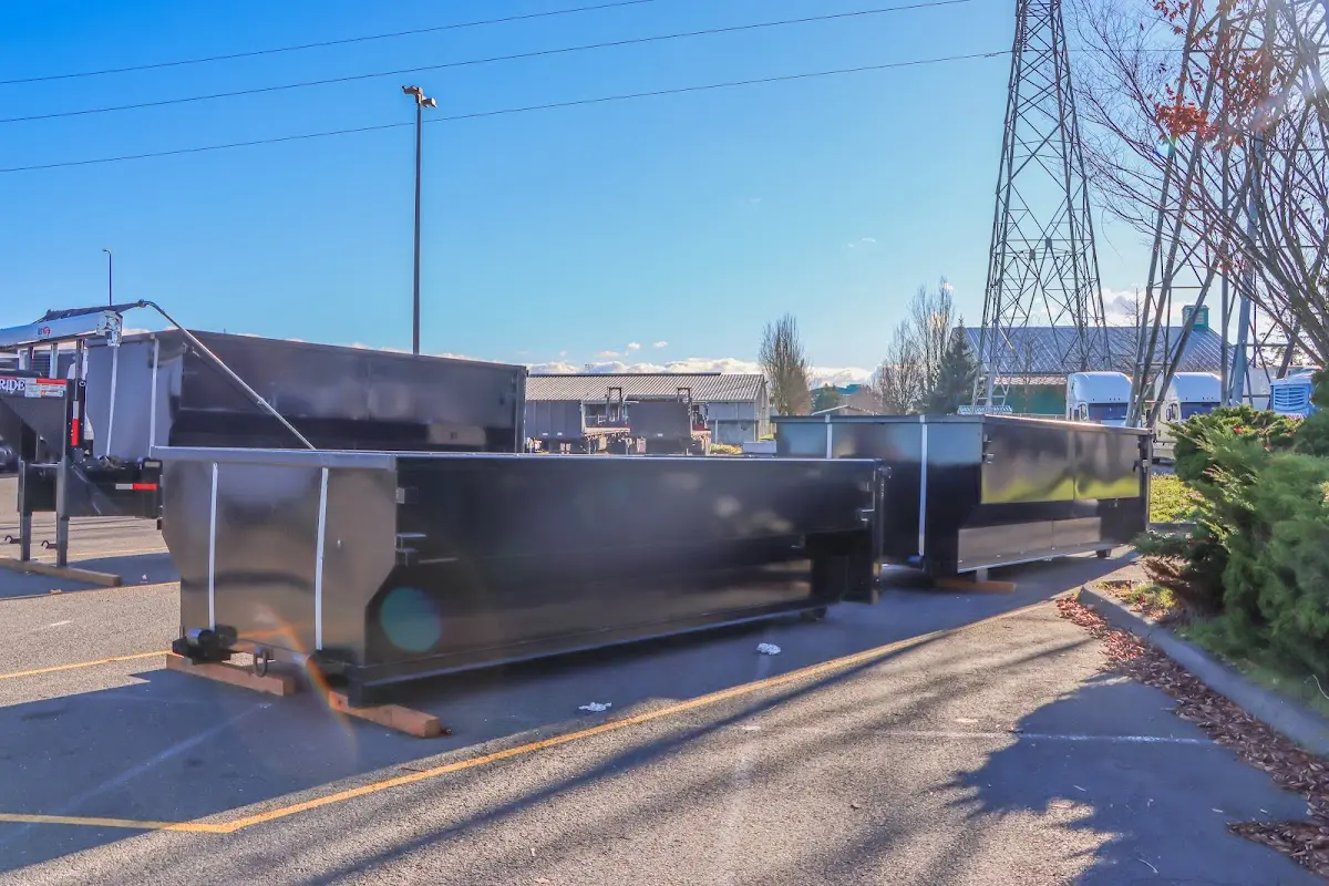 Roll-off dumpster ready for waste disposal at job site for 2 Yard Dumpster Rental in Mattapoisett